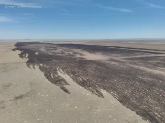 Aerial view of fire-scorched prairie in Kiowa County, Colorado.