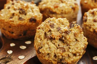 Close up view of oatmeal raisin muffins.